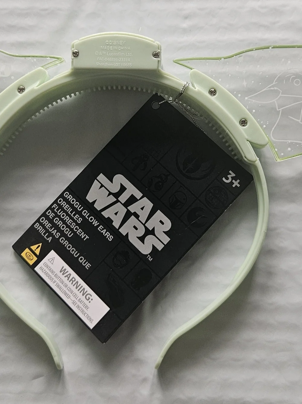 Disney Parks Star Wars Grogu ears headband feature translucent light-up ears.